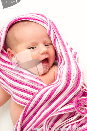 Image of smiling newborn baby