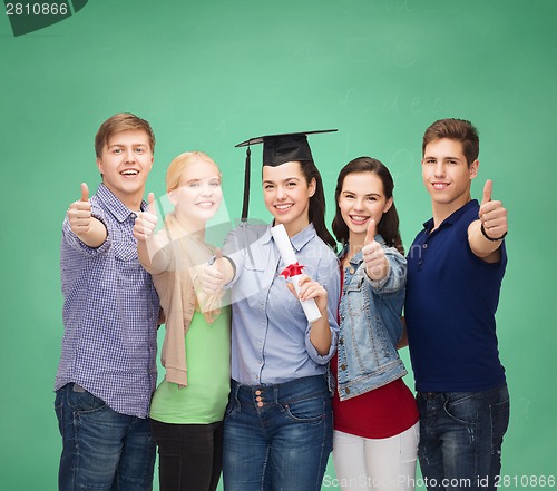 Image of group of students with diploma showing thumbs up