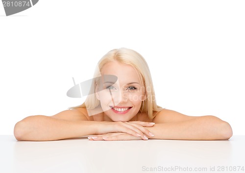 Image of clean face and shoulders of beautiful young woman