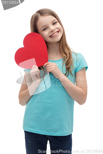 Image of smiling little girl with red heart