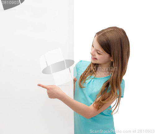 Image of happy little girl with blank white board