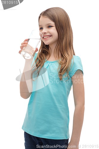 Image of smiling little girl with glass of water