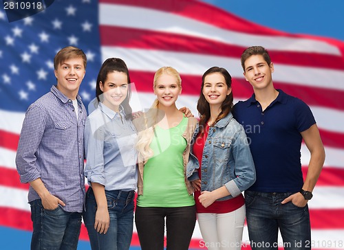 Image of group of standing smiling students