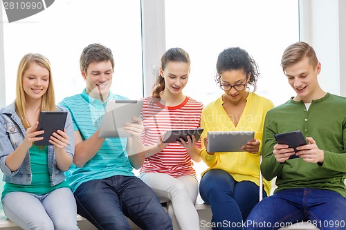 Image of smiling students with tablet pc computer