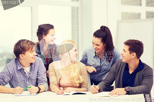 Image of students having discussion at school
