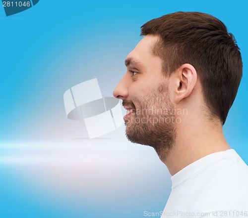 Image of portrait of smiling young handsome man