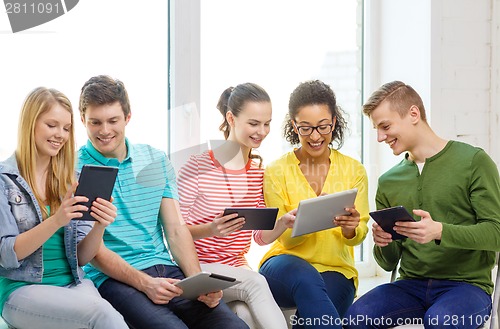 Image of smiling students with tablet pc computer