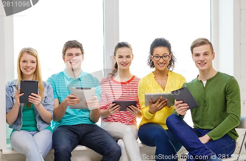 Image of smiling students with tablet pc computer