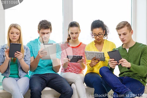 Image of smiling students with tablet pc computer
