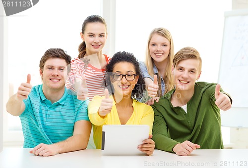 Image of smiling students with tablet pc computer at school