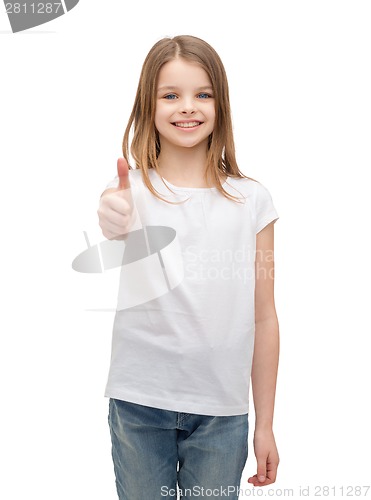 Image of little girl in blank white tshirt showing thumbsup