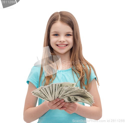 Image of smiling little girl with dollar cash money