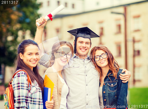 Image of students or teenagers with files and diploma