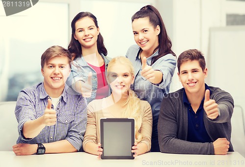 Image of smiling students with blank tablet pc screen