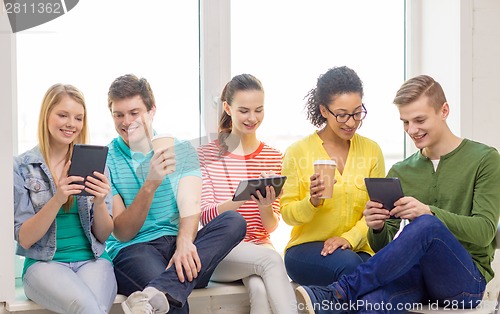 Image of smiling students with tablet pc computer