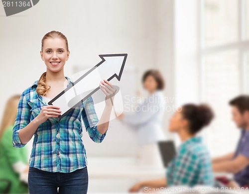 Image of smiling young woman with arrow poiting up