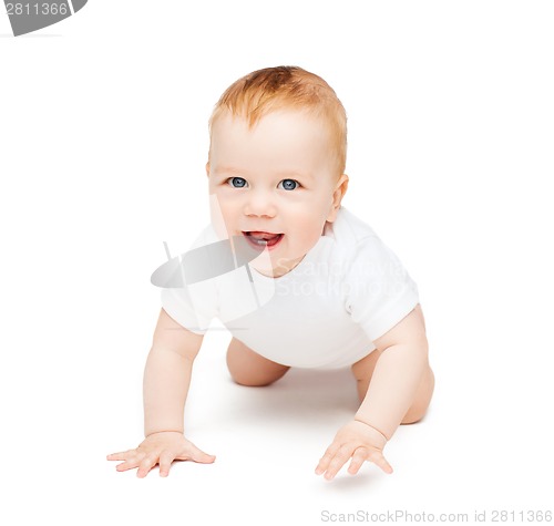 Image of crawling smiling baby looking up