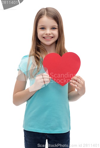 Image of smiling little girl with red heart