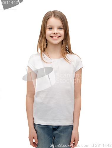 Image of smiling little girl in white blank t-shirt