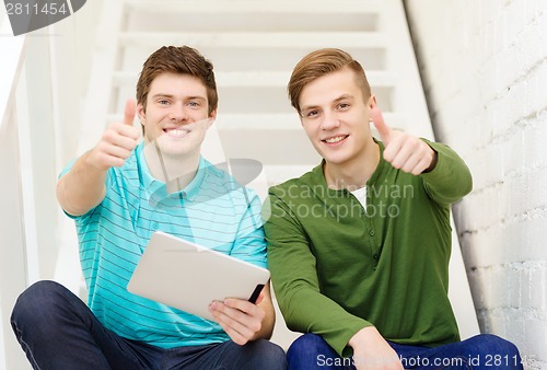 Image of smiling male students with tablet pc computer