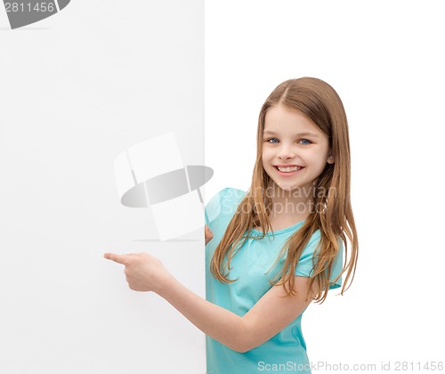 Image of happy little girl with blank white board