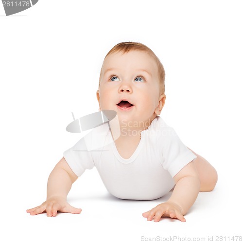 Image of crawling curious baby looking up