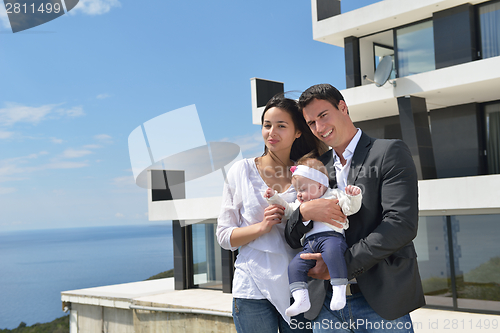Image of happy young family at home