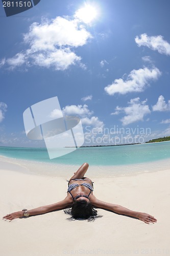 Image of beautiful young woman  on beach have fun and relax