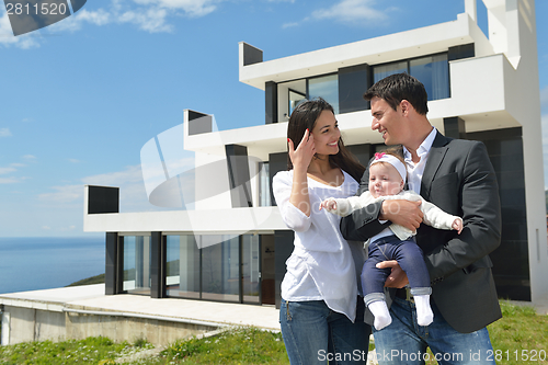 Image of happy young family at home