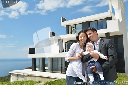 Image of happy young family at home