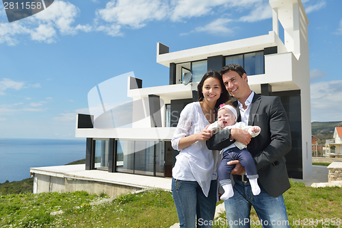 Image of happy young family at home