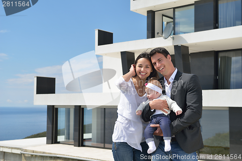 Image of happy young family at home