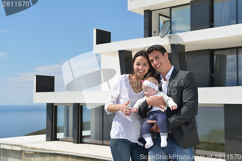 Image of happy young family at home