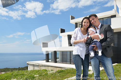 Image of happy young family at home
