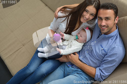 Image of happy young family at home