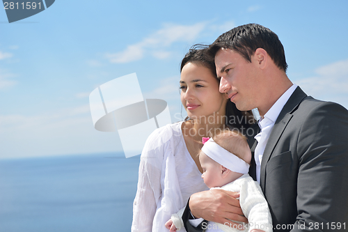 Image of happy young family at home