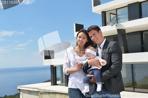Image of happy young family at home