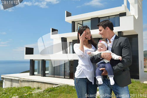 Image of happy young family at home