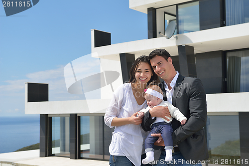 Image of happy young family at home