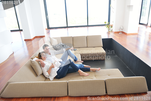 Image of young couple relax at home