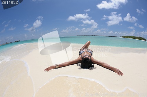 Image of beautiful young woman  on beach have fun and relax