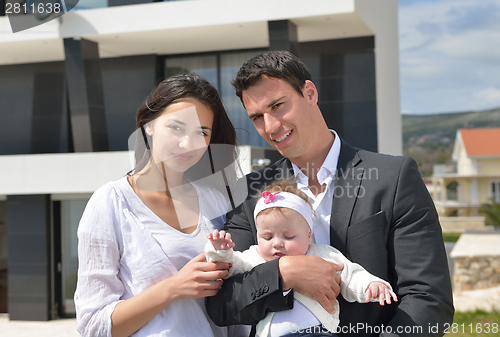 Image of happy young family at home