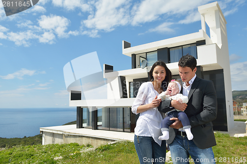 Image of happy young family at home