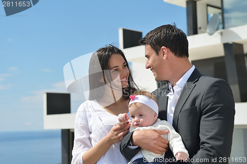 Image of happy young family at home