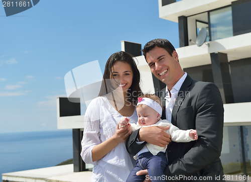Image of happy young family at home