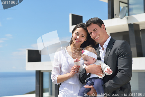 Image of happy young family at home