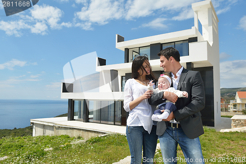 Image of happy young family at home