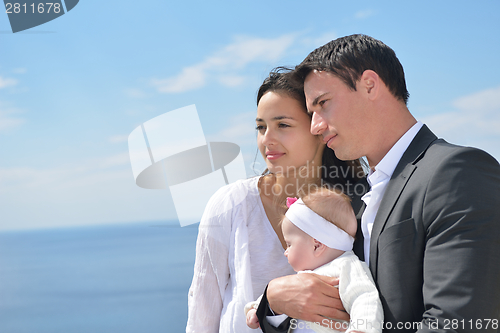 Image of happy young family at home