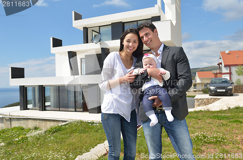 Image of happy young family at home