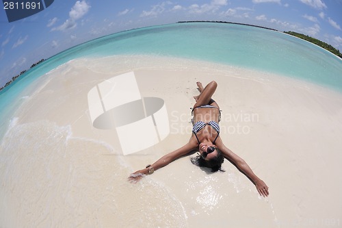 Image of beautiful young woman  on beach have fun and relax